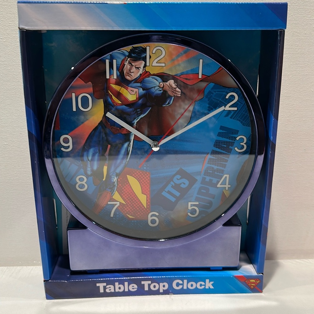 DC Superman Table Top Analog Display Clock. 1 AA Battery not included.